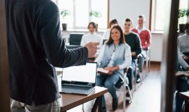 cheerful-mood-group-of-people-at-business-conference-in-modern-classroom-at-daytime-min-min-min